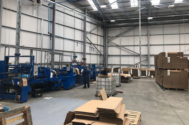 Demolition of existing factory & construction of new purpose built factory & warehouse 16